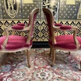 Paire de fauteuils cabriolet de style Louis XV velours rouge