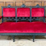 Large Japanese-style sofa in carved wood and red velvet, 19th century