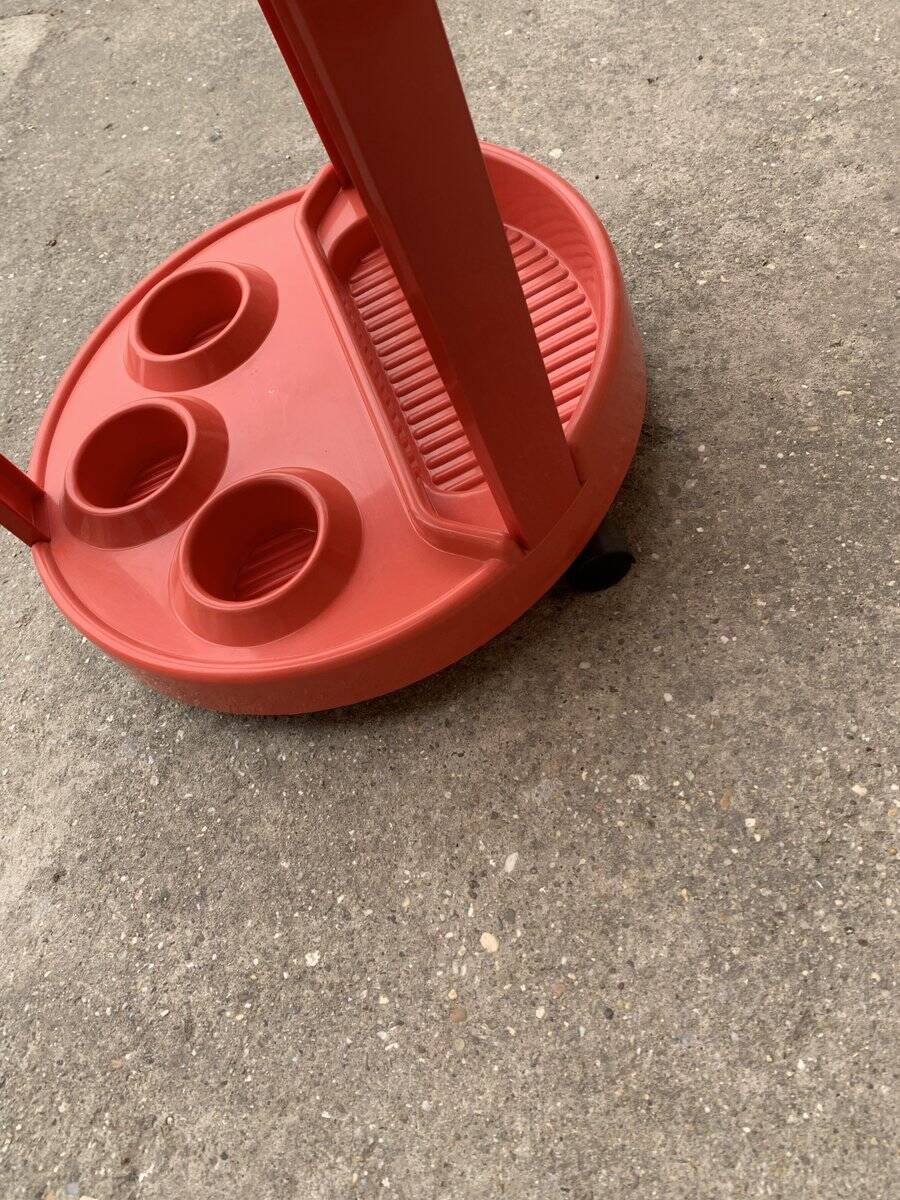 Round red bar cart in injected plastic, Mid-Century Italian style, 1970s.