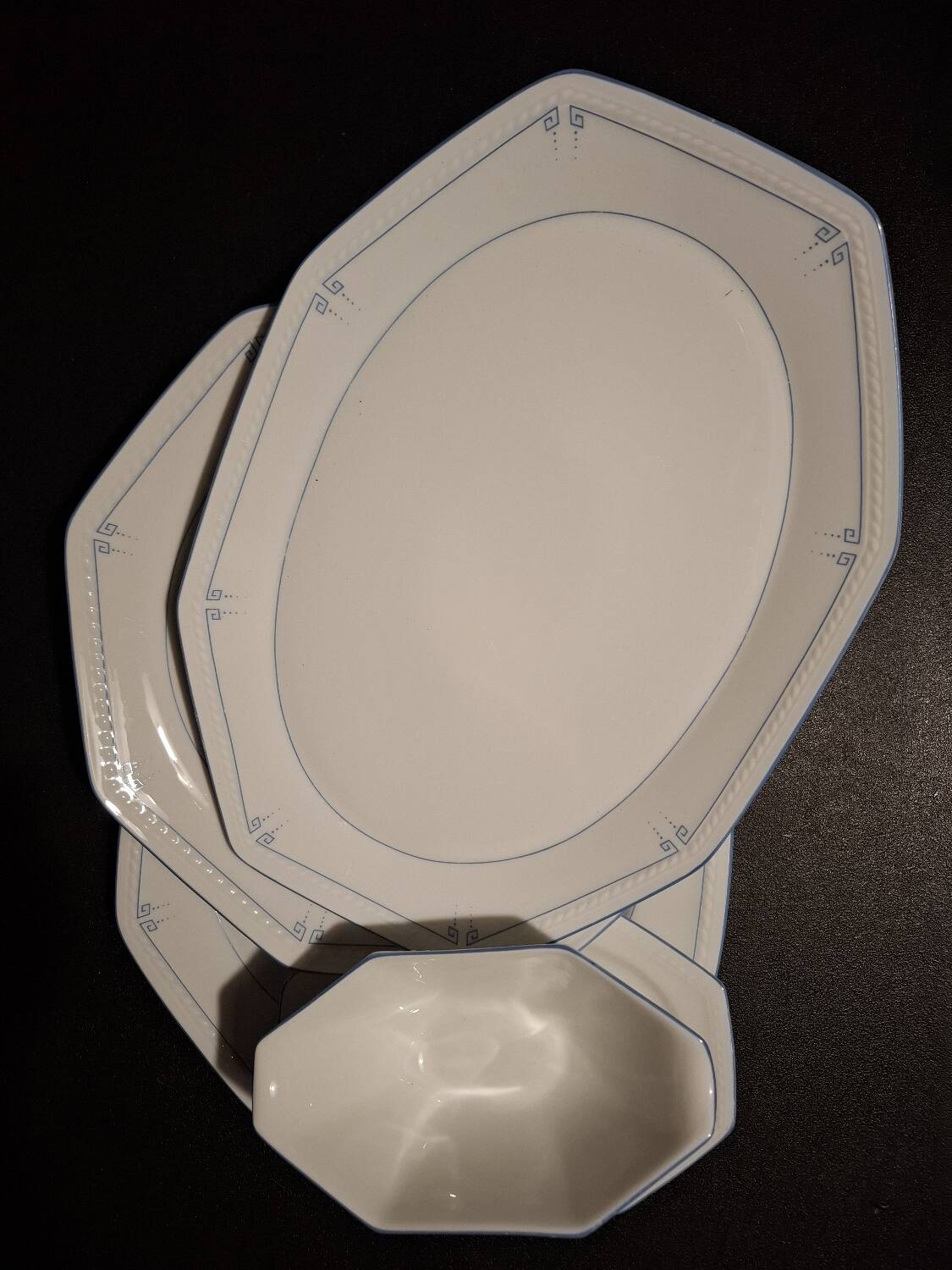 Dishes and porcelain sauceboat