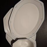 Dishes and porcelain sauceboat