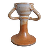 Anthropomorphic sandstone egg cup signed GL
