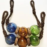 Fishing floats made of blown glass, cork, and rope. France, 1960s.