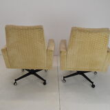 Pair of mid-century swivel armchairs with wheels 1970's