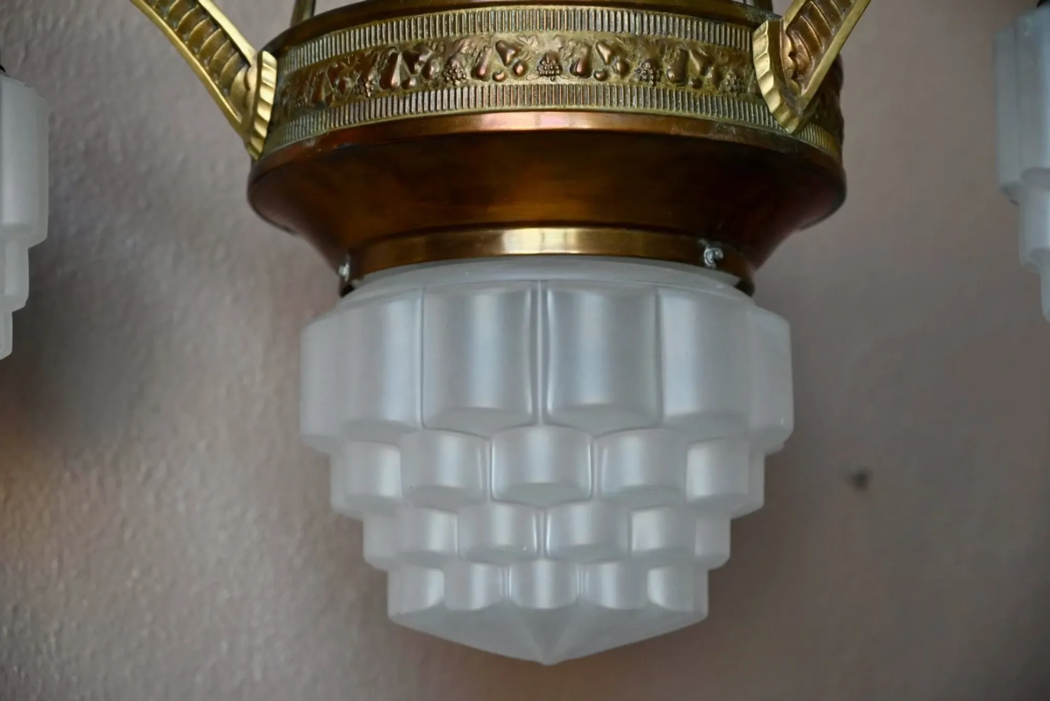 Art Deco lustre in brass and frosted pressed glass from the 1930s.