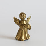 Brass cherub candle holder