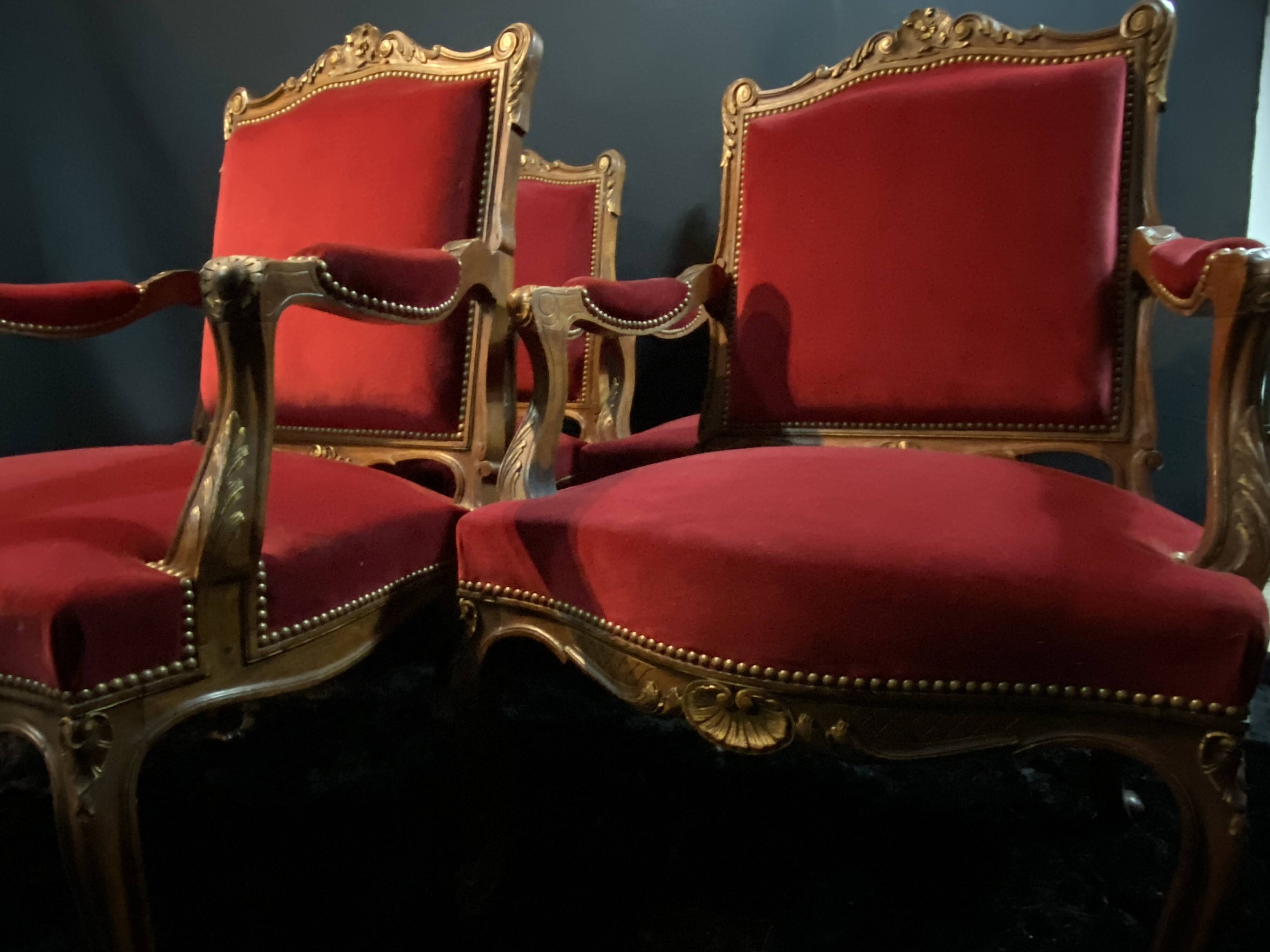 Pair of flat-back armchairs in Louis XV style in red velvet.