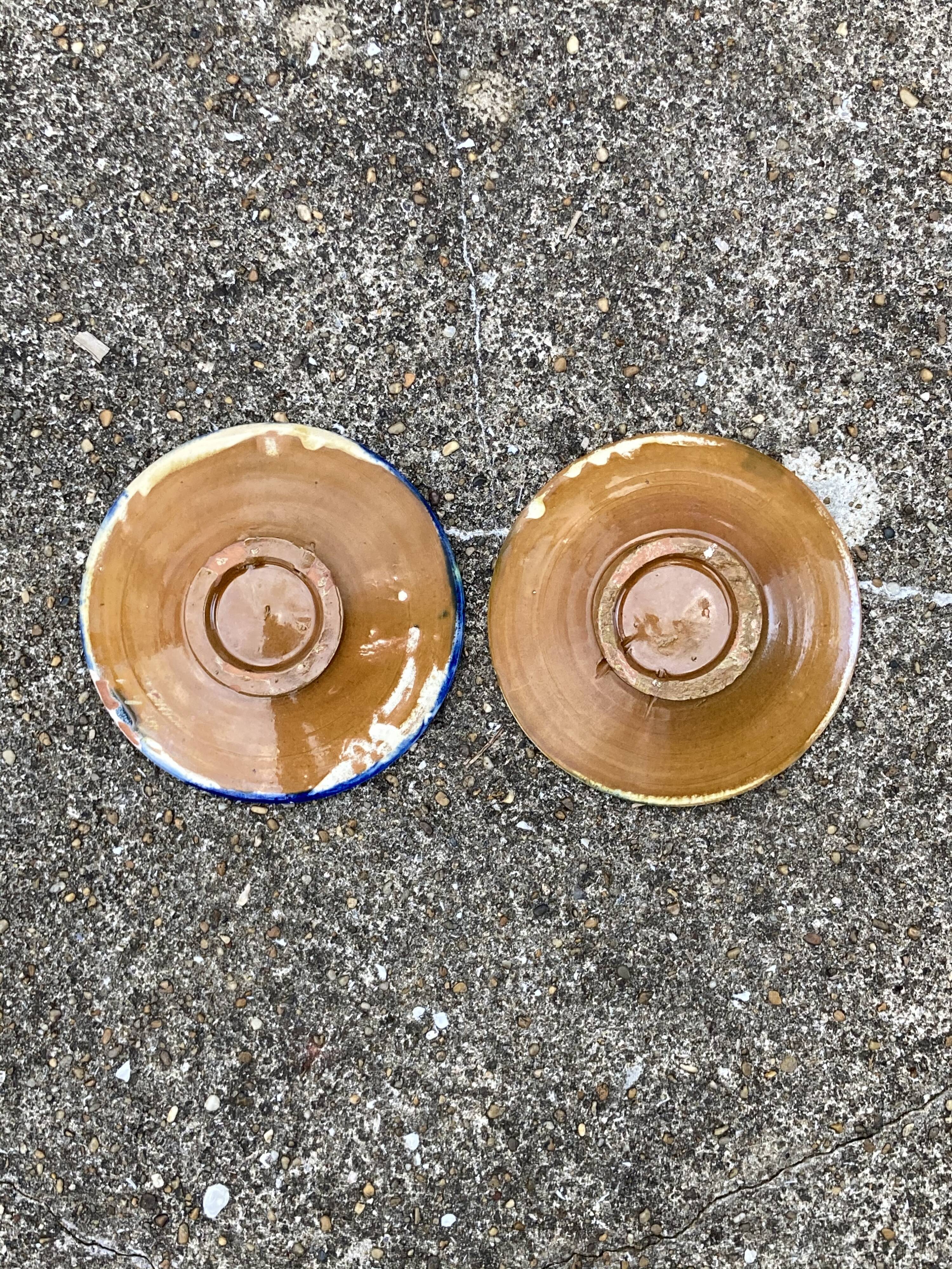 Two artisanal ceramic plates