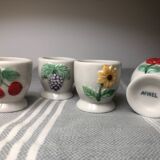 Ceramic shells with relief decoration of flowers (yellow and red) and fruits (cherries and grapes)