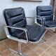 Pair of vintage leather and aluminum armchairs, restored