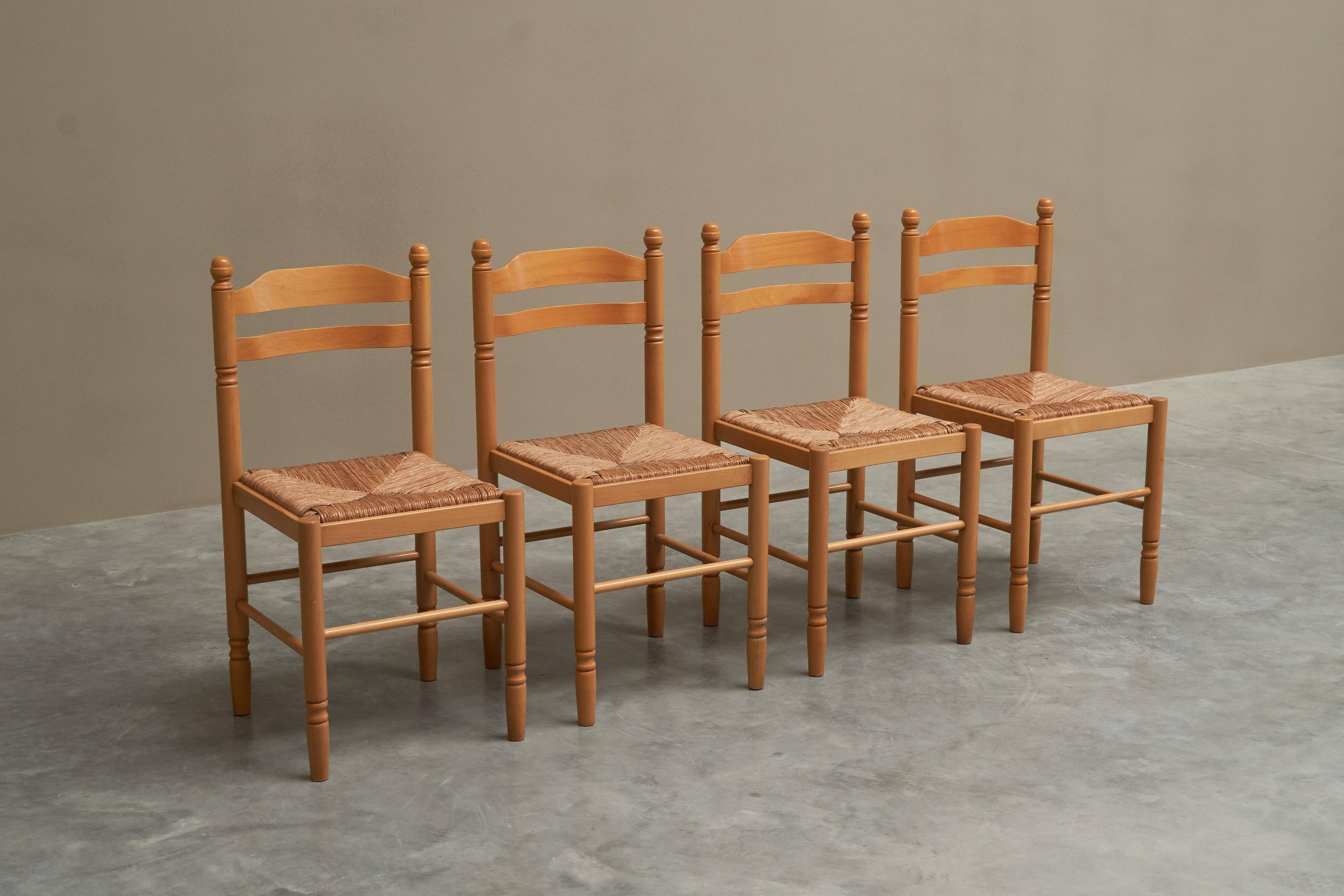 Set of 4 Mid Century beech dining chairs from the 1970s.