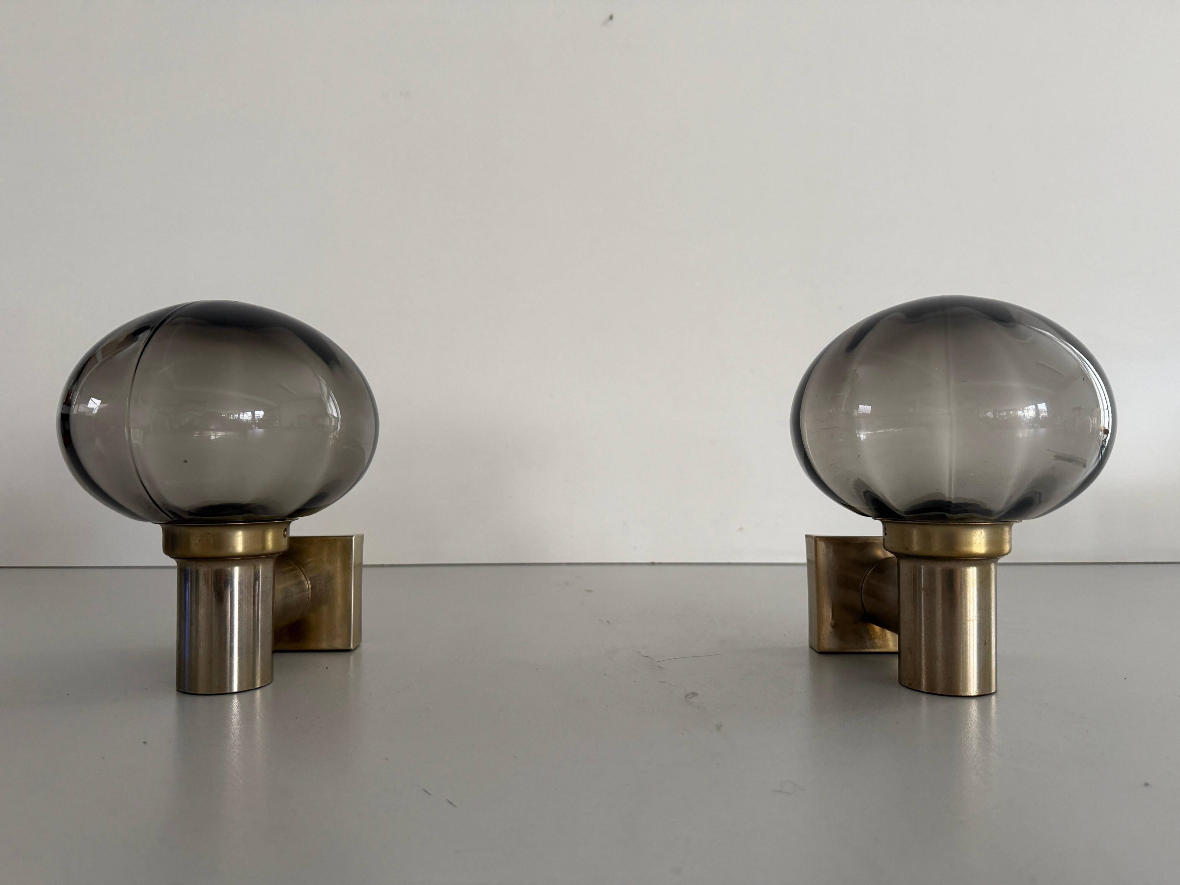 Pair of grey glass and chrome wall lights from the mid-century by N Leuchten, 1960s, Germany.