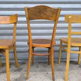 Set of four mismatched bistro chairs