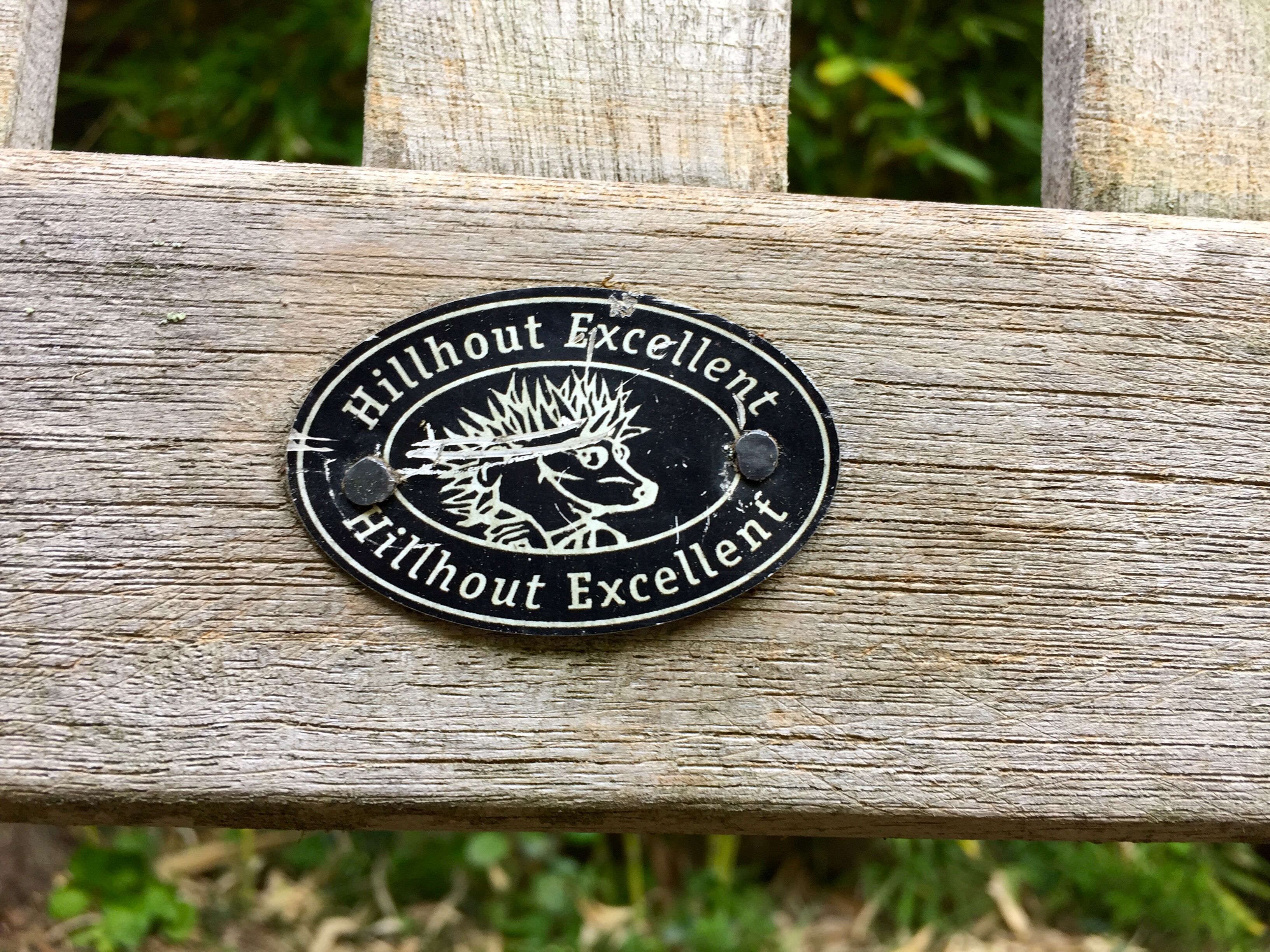 Vintage wooden garden bench with wheels