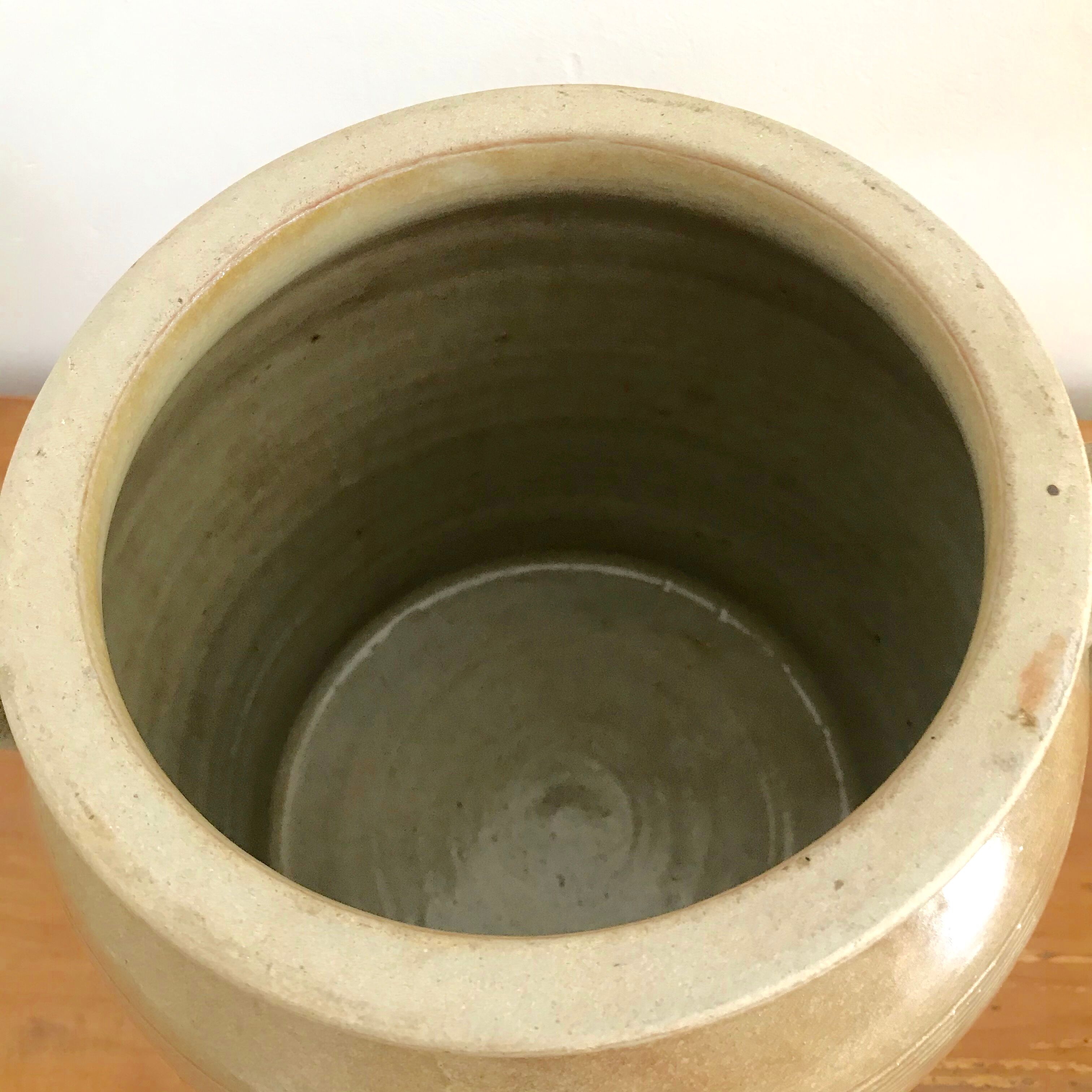 Eared sandstone jar and lid