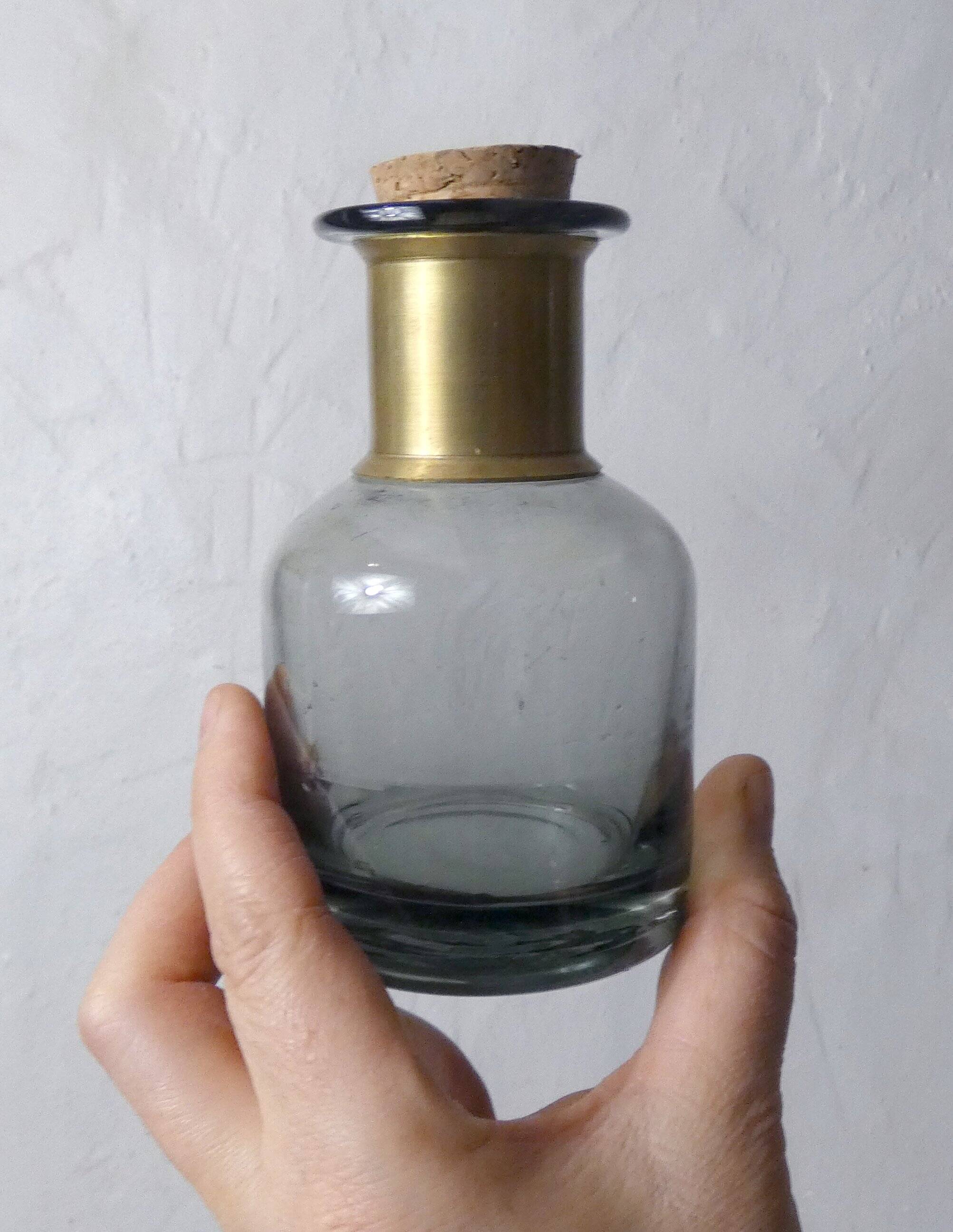 Smoked glass apothecary bottle with brass band