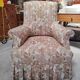 Antique armchair fully restored with brass wheels.