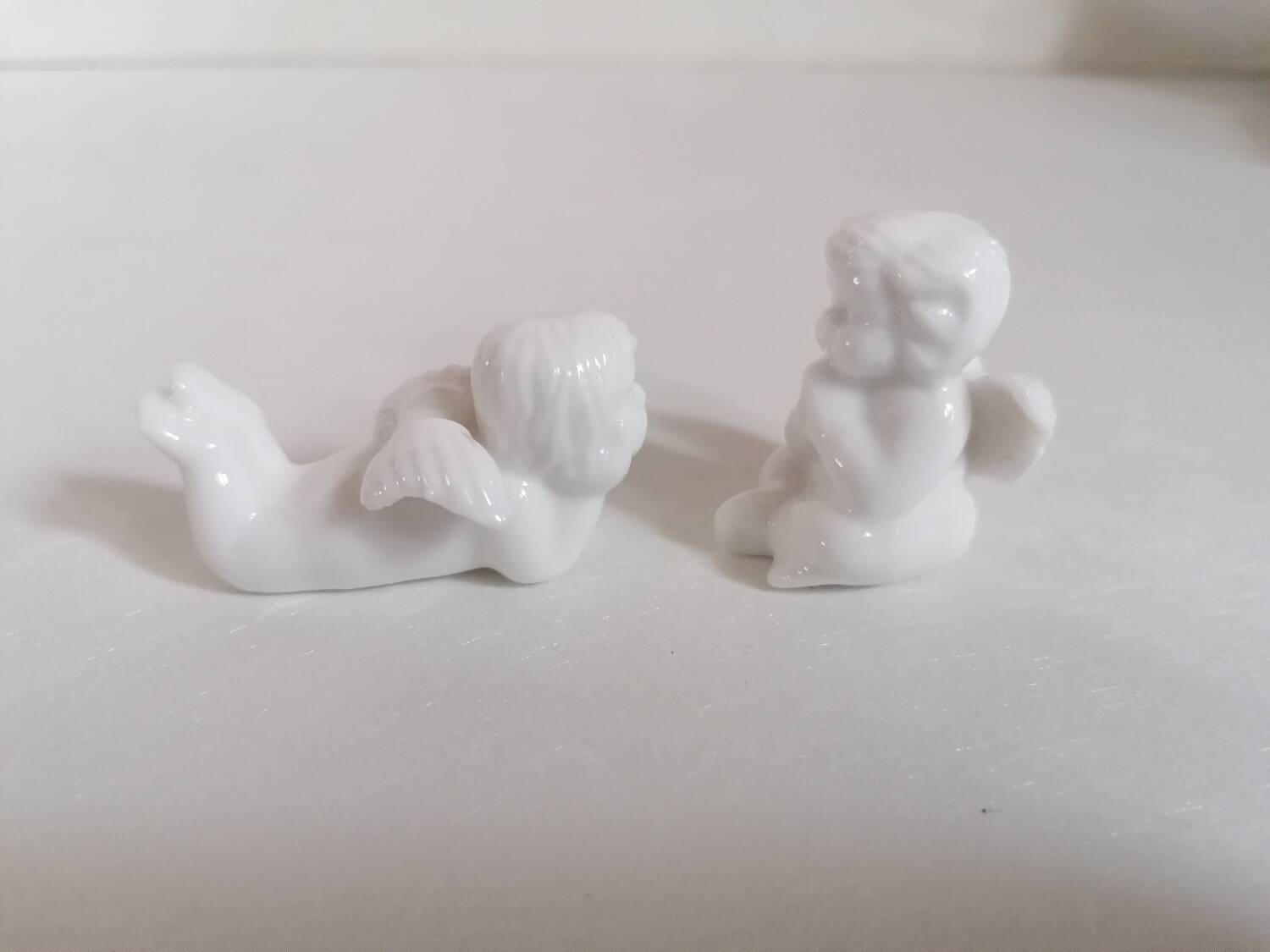 Lot 6 knife holders and 6 porcelain place markers putti angels