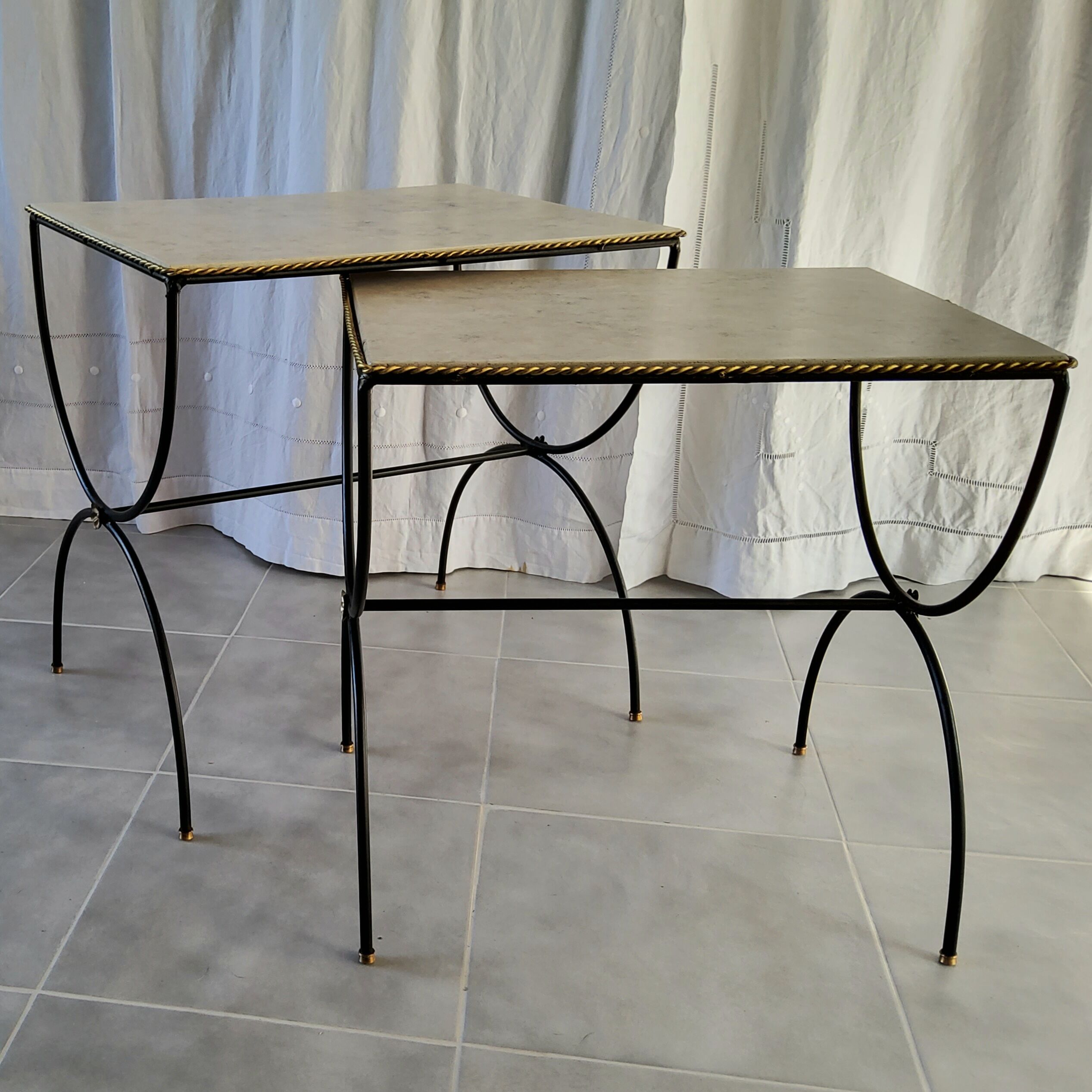 Pair of curule nesting tables