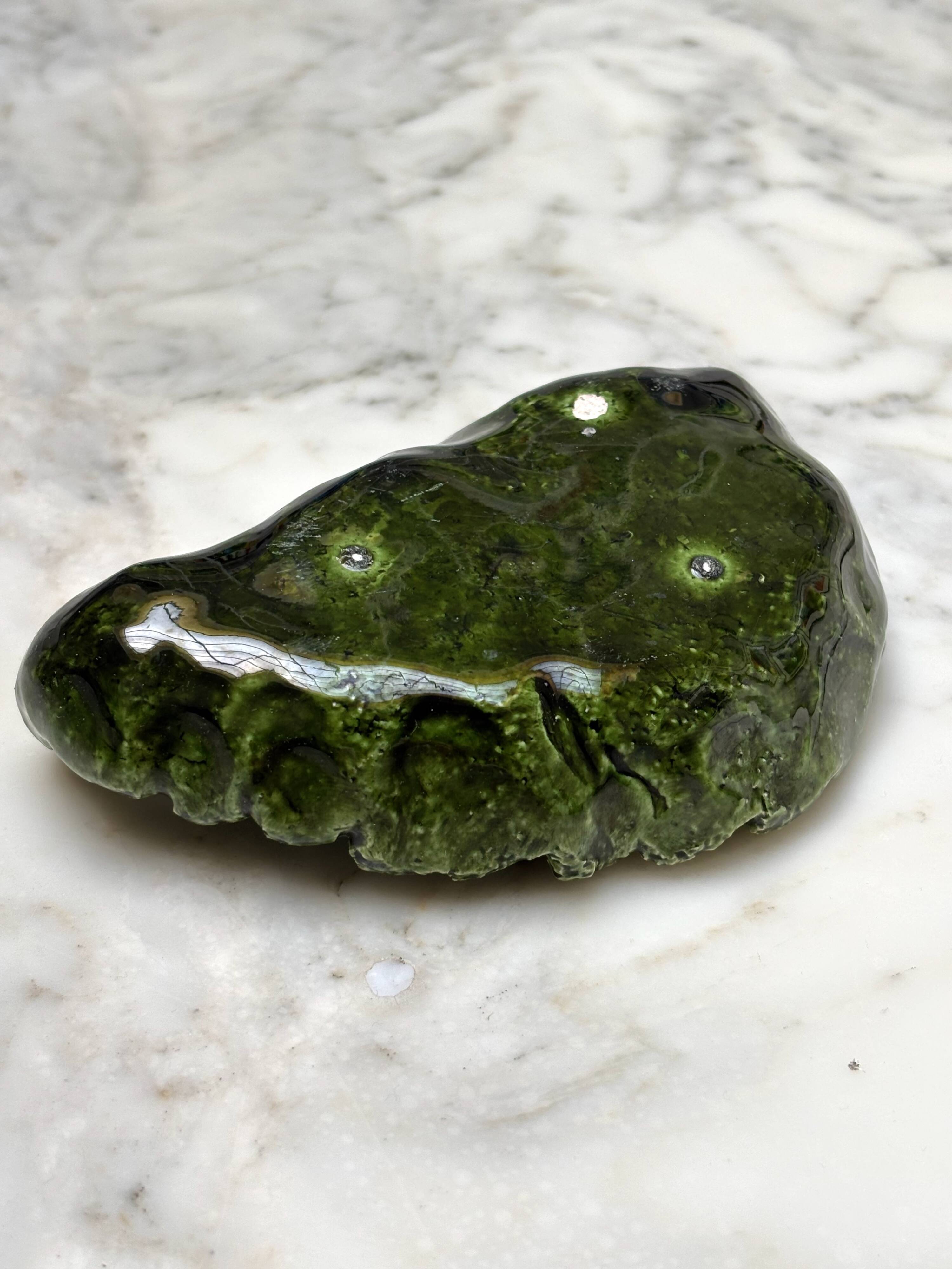 Small candle holder in green slip ceramic