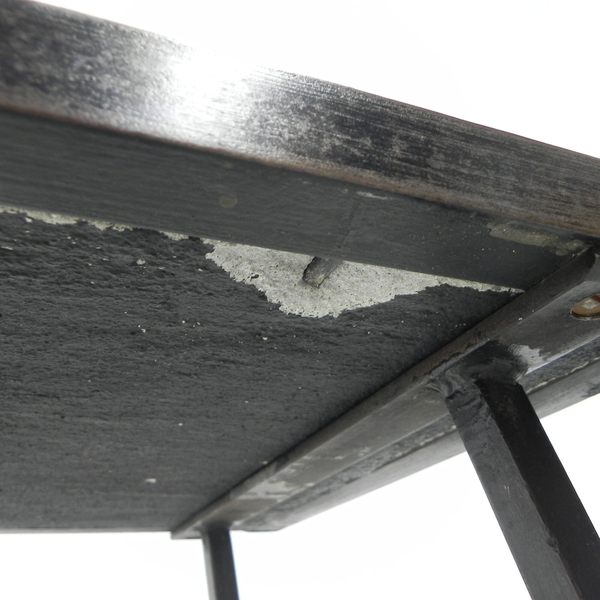 Brutalist coffee table with slate top