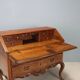 Antique baroque secretary cabinet with a drop-down front in walnut and maple, Italy, 18th century.