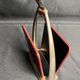 Longchamp, empty pocket document holder with leather and gold metal stirrup from around 1970.