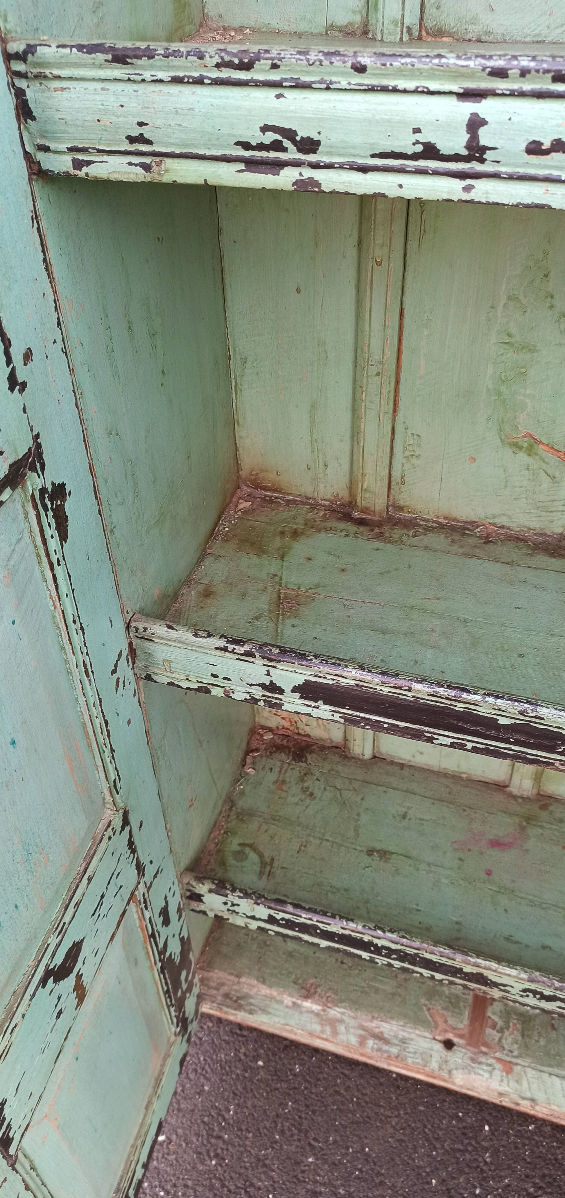 Old wooden cabinet with beautiful green patina