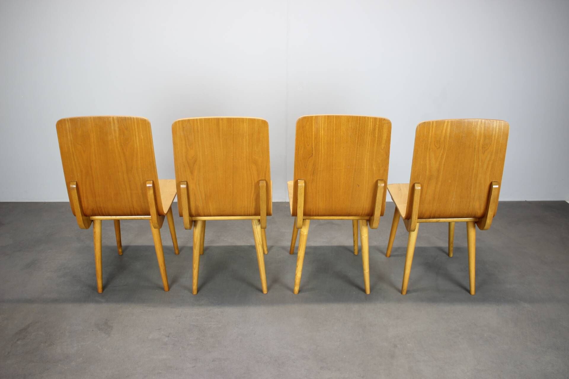 Set of 4 vintage wooden dining chairs in mid-century modern style, Europe, 1970s.