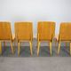 Set of 4 vintage wooden dining chairs in mid-century modern style, Europe, 1970s.