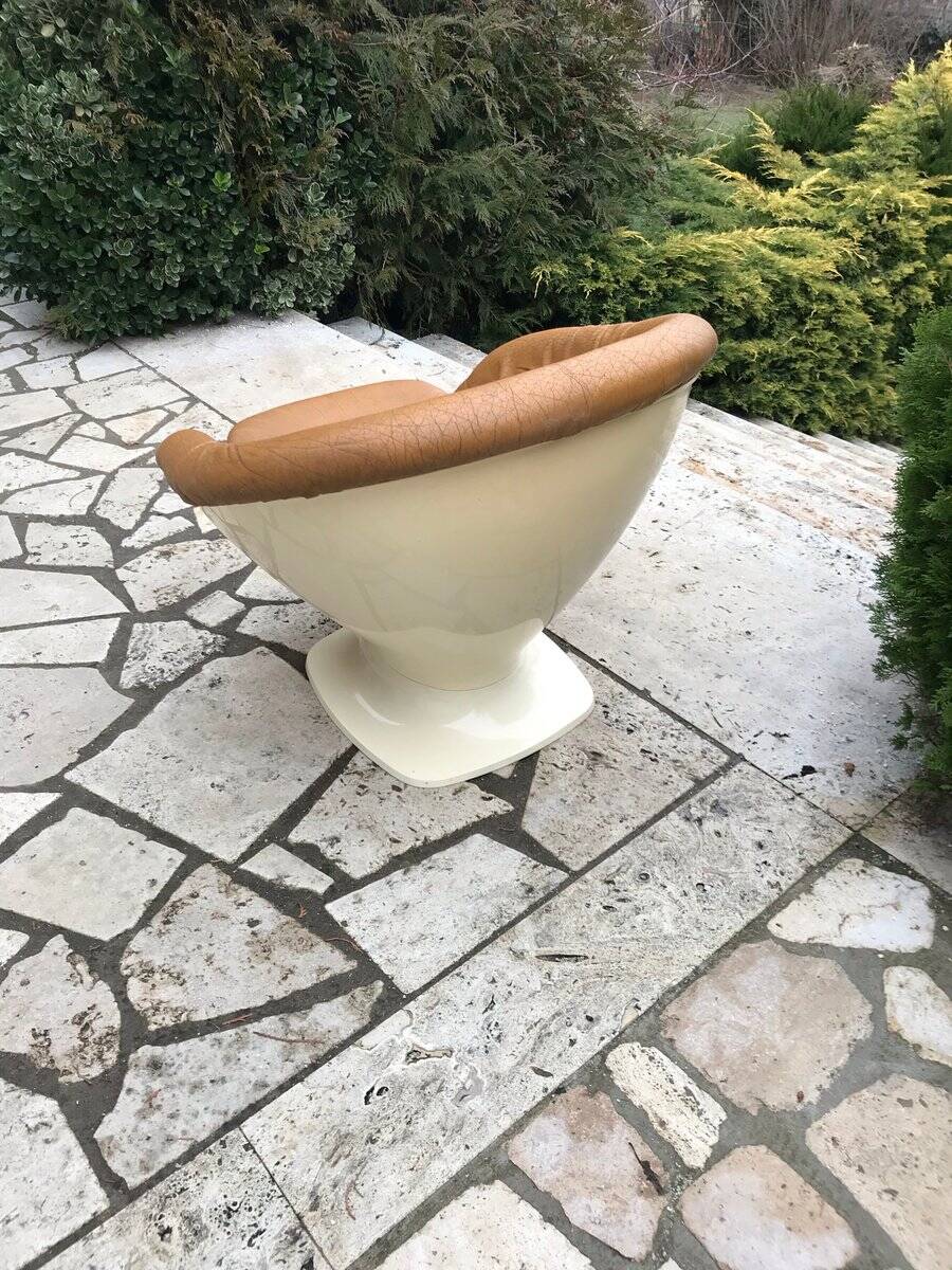 Brown tulip club chair in fibreglass resin and faux leather, France 1970s by Raphaël