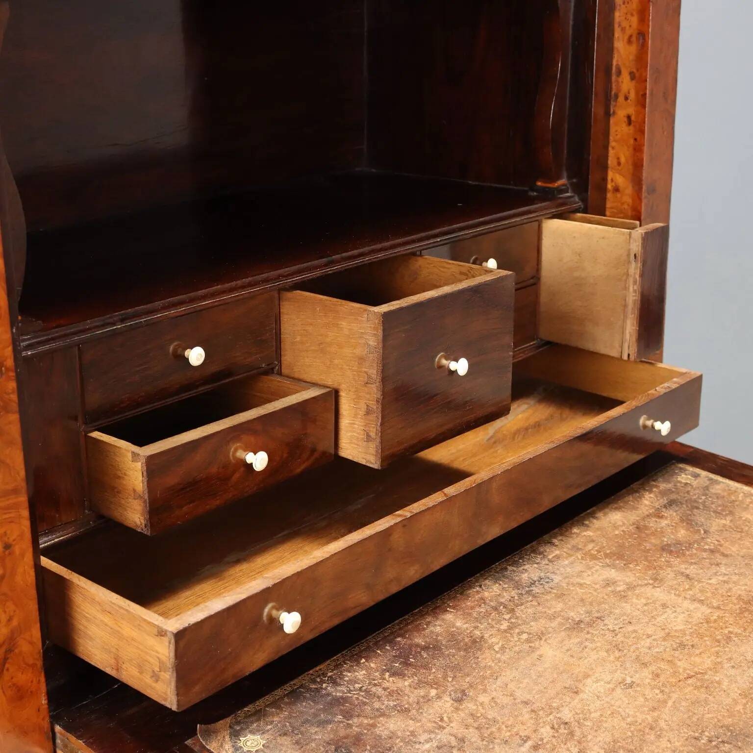 Former secretary in elm with a marble top, France, 19th century.