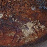 Signed textured terracotta vase