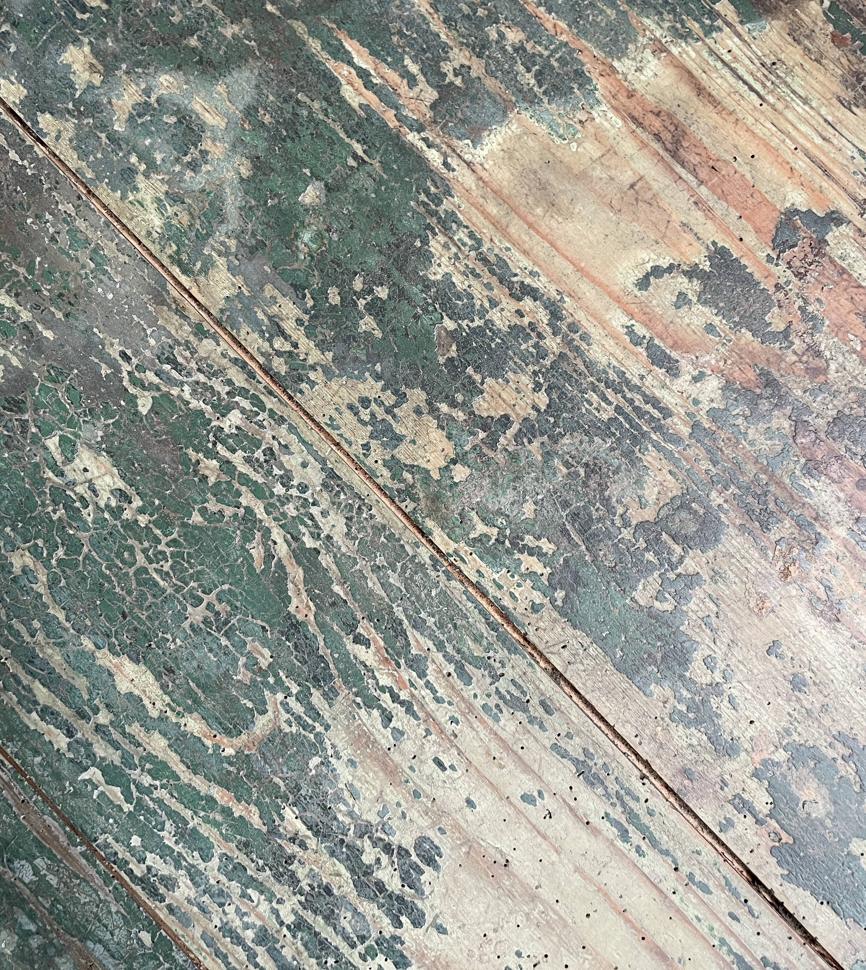 Vintage farm table with spindle legs.