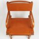 Leather armchair by Jacques Adnet