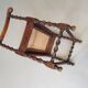Wokkel chair with armrests and webbing seat