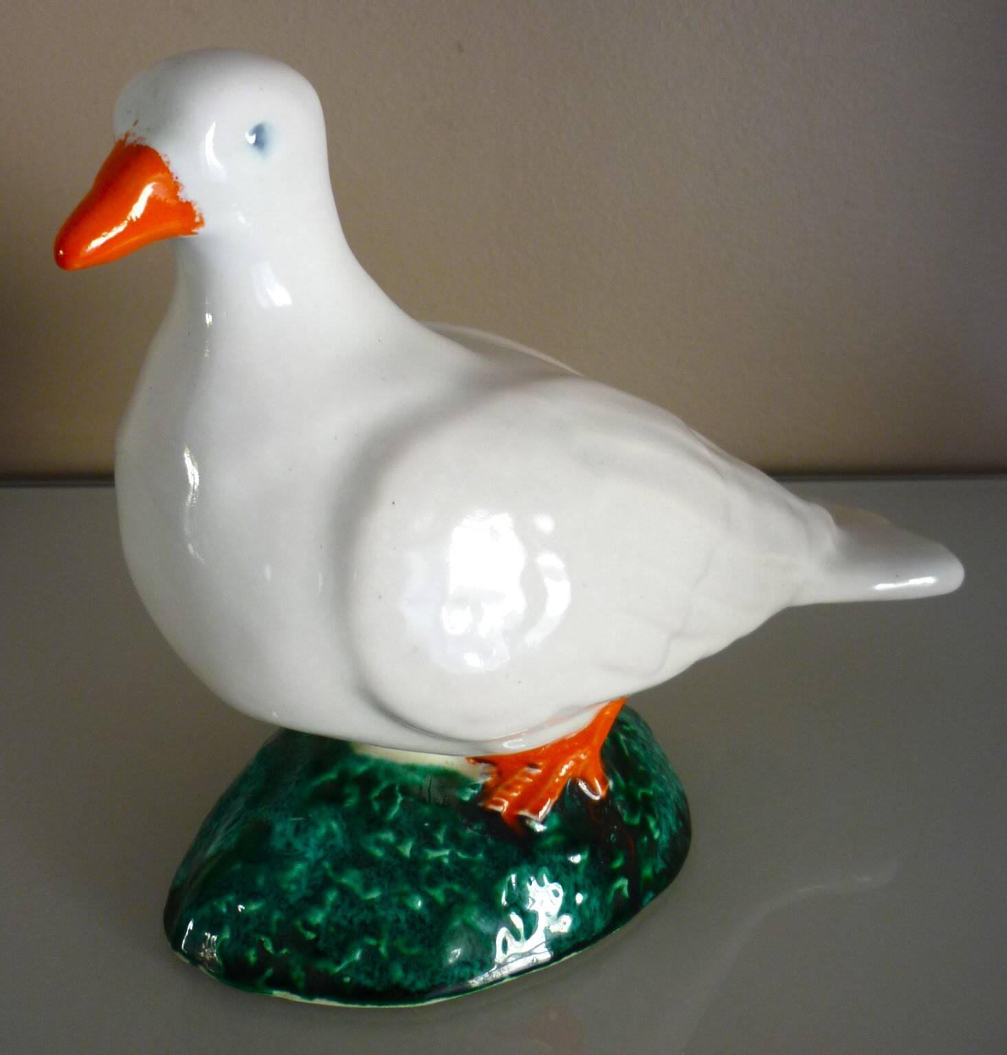 Glazed ceramic bird, signed Vallauris with bright colors