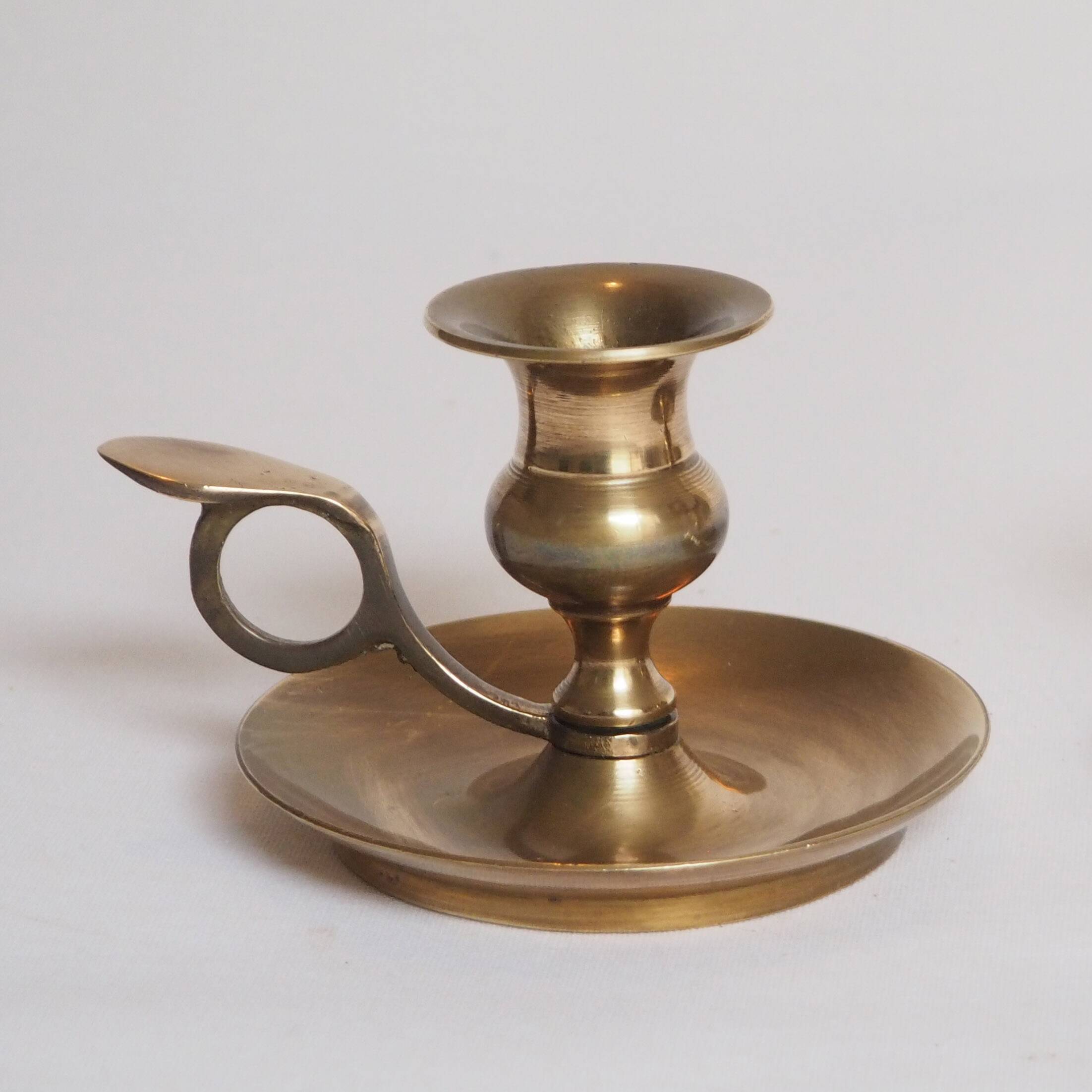 Brass candle holder with cup and handle