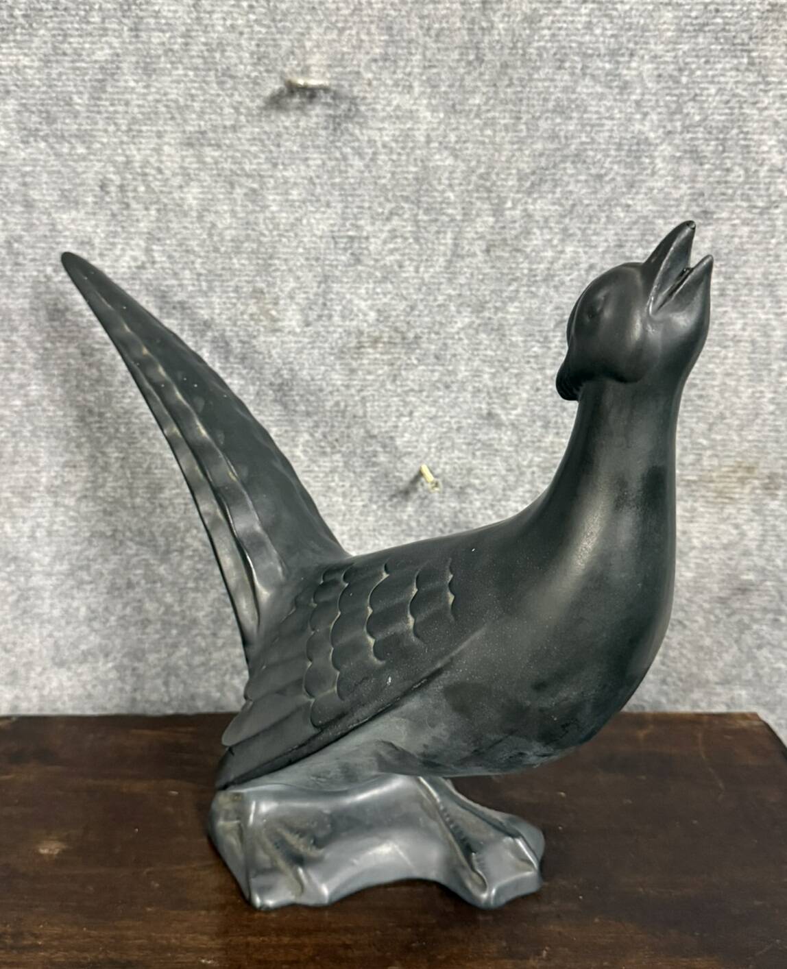 Black lacquered ceramic from the Art Deco period: bird signed Jean