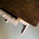 Rustic pink painted desk with brown tabletop
