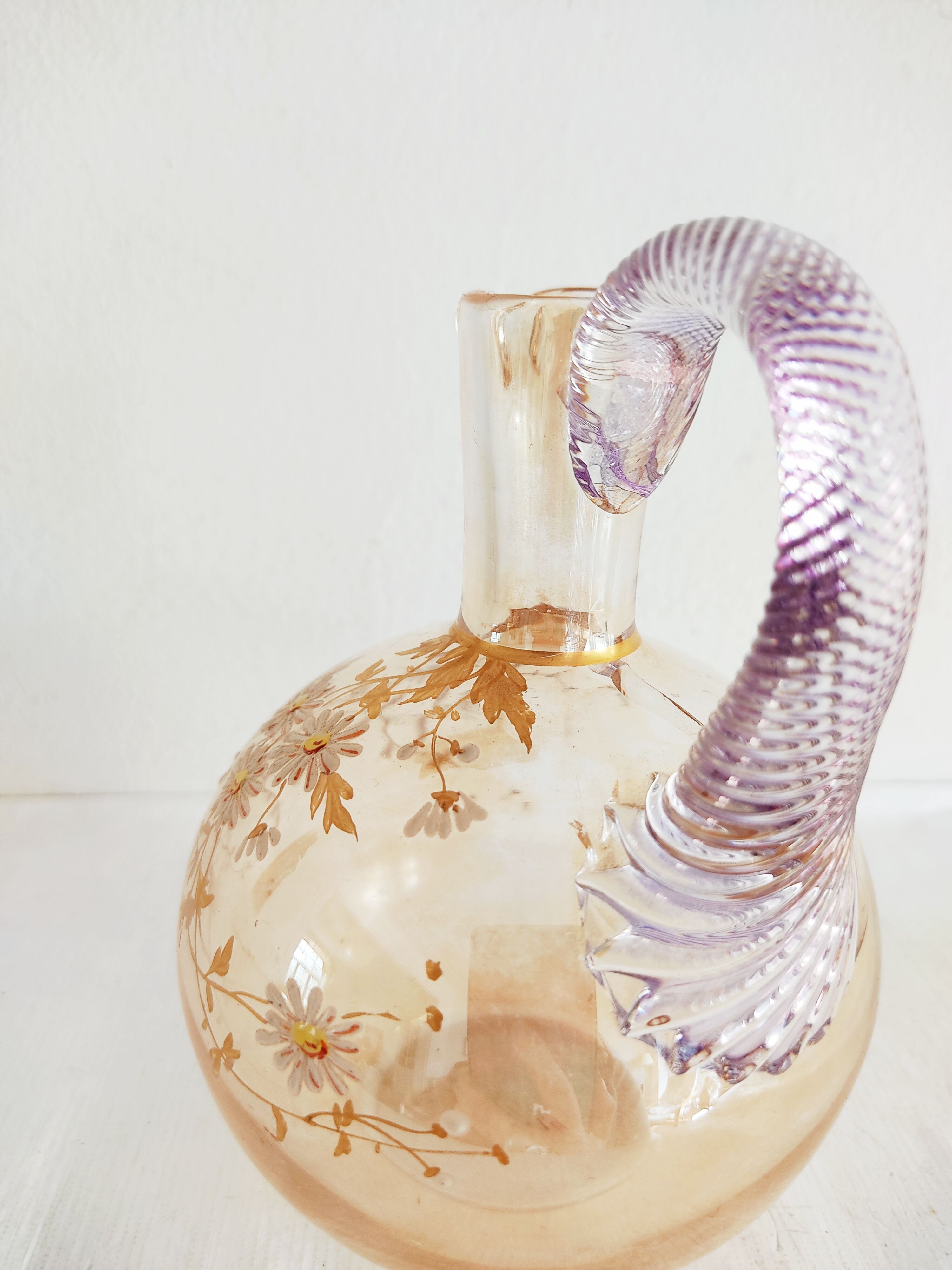 Glass pitcher decorated with 19th century flowers