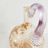 Glass pitcher decorated with 19th century flowers