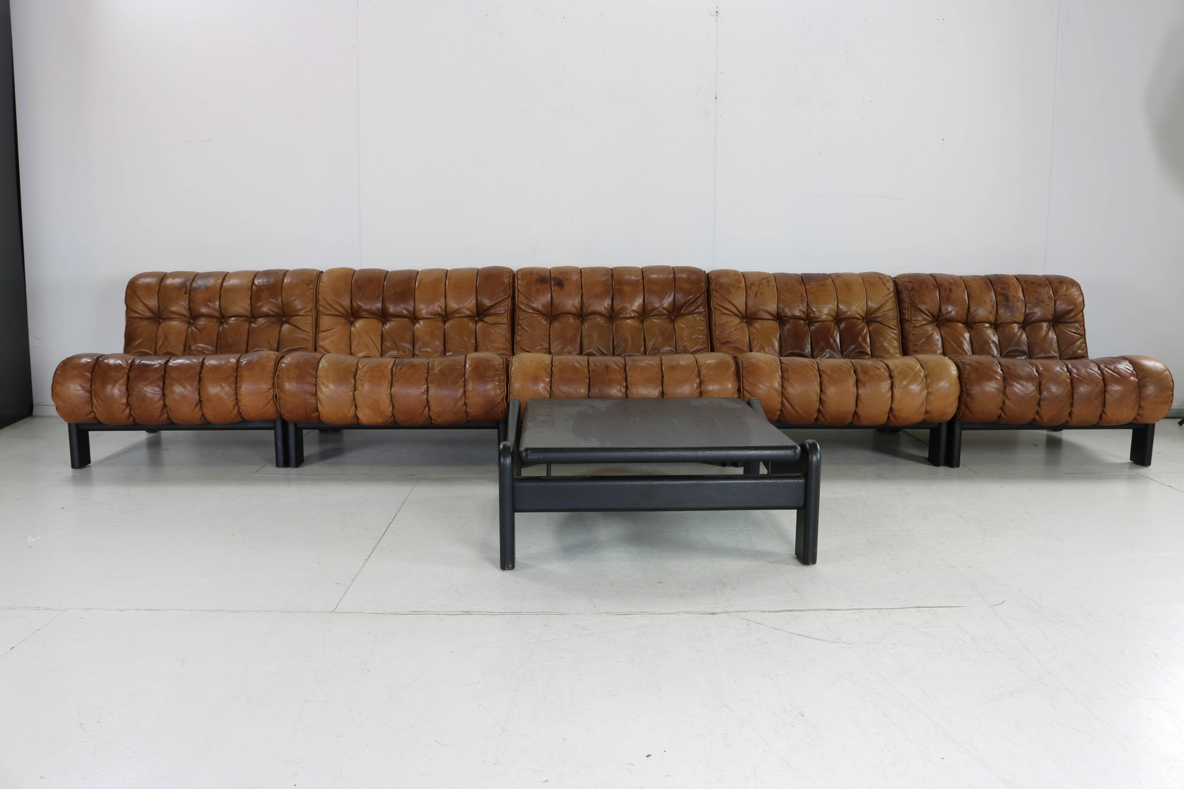 70s living room set in cognac brown leather with black wenge wood frame