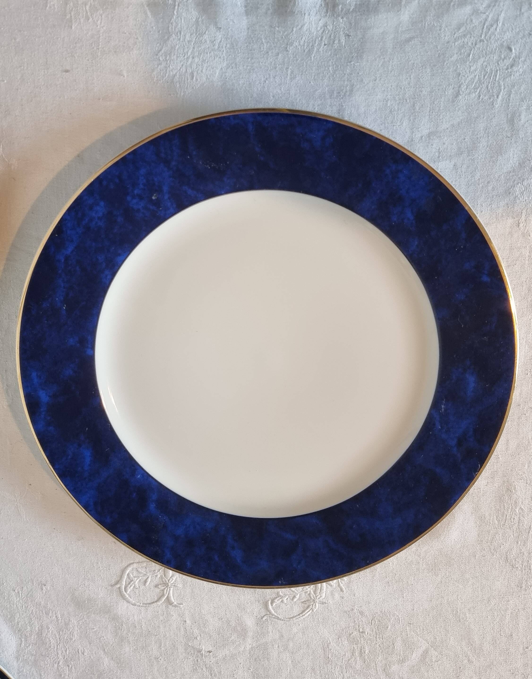 18-piece porcelain dinnerware set from Limoges by Philippe Deshoulières.