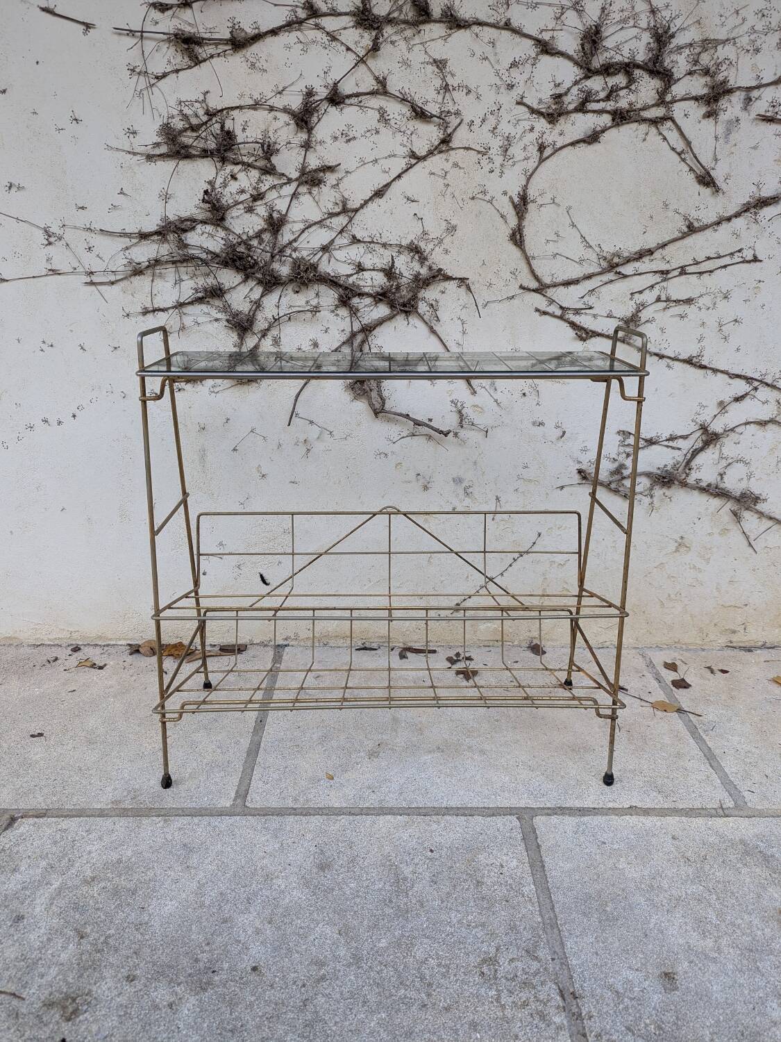 Gold metal magazine rack