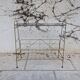 Gold metal magazine rack