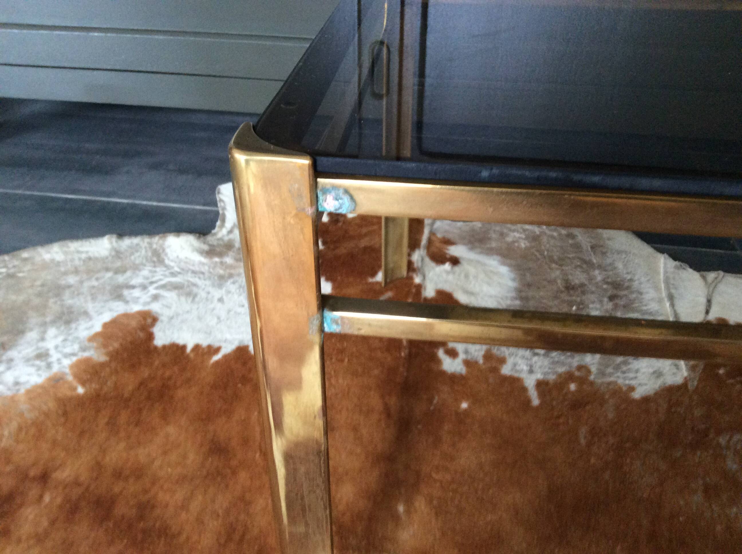Glass and brass coffee table