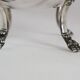 Silver sugar bowl with paw feet and ornate handles