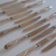 12 silver metal table knives 25.5 cm