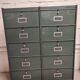 10-compartment metal locker with hinged door from the 50s